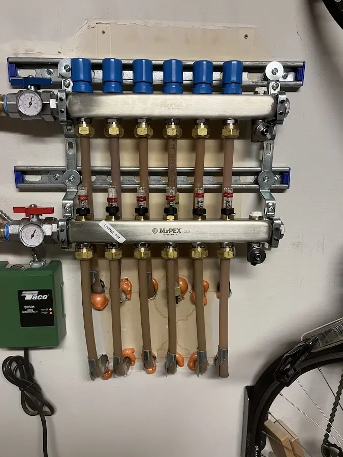 Plumber performing Gas Line Installation at a residential property in Mason